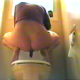 Simone squats over a toilet and takes a decent dump. Next she shows us the finished product. About 1.5 minutes.